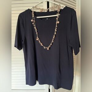 A Talbots short sleeve T-shirt with a scalloped neck line